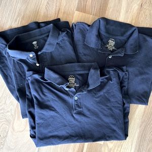 Three short sleeve size 18 navy polo shirts